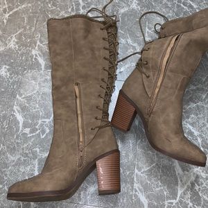 Knee high, high heel boots. Worn a couple of times! Bought off just fab.